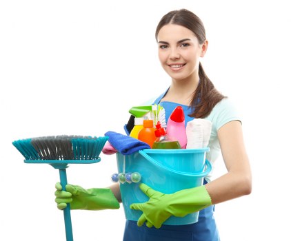 Local oven cleaner working carefully in a Barnes residential property